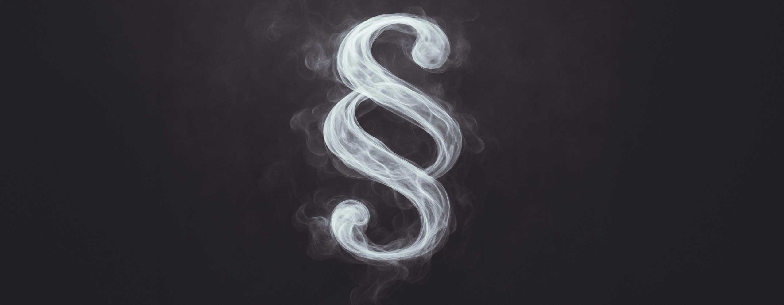 A section symbol made of smoke