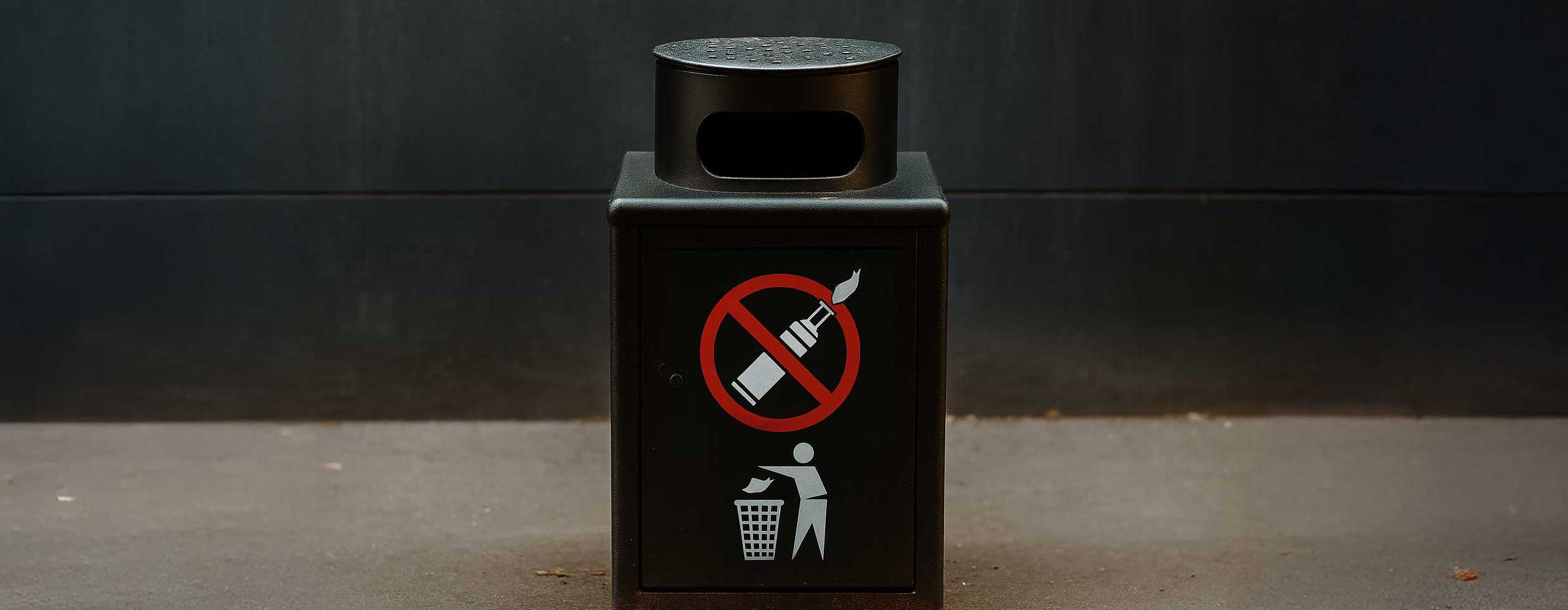 Trash cans with a no-vapes symbol
