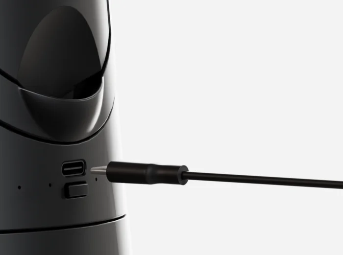 USB-C cable being plugged into the back of the Shii